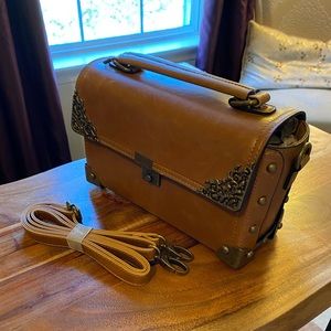 Vintage-inspired brown leather purse.